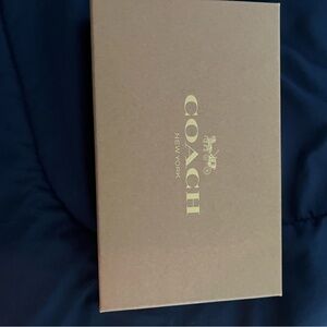 Used Coach purse -crossbody and new wristlet